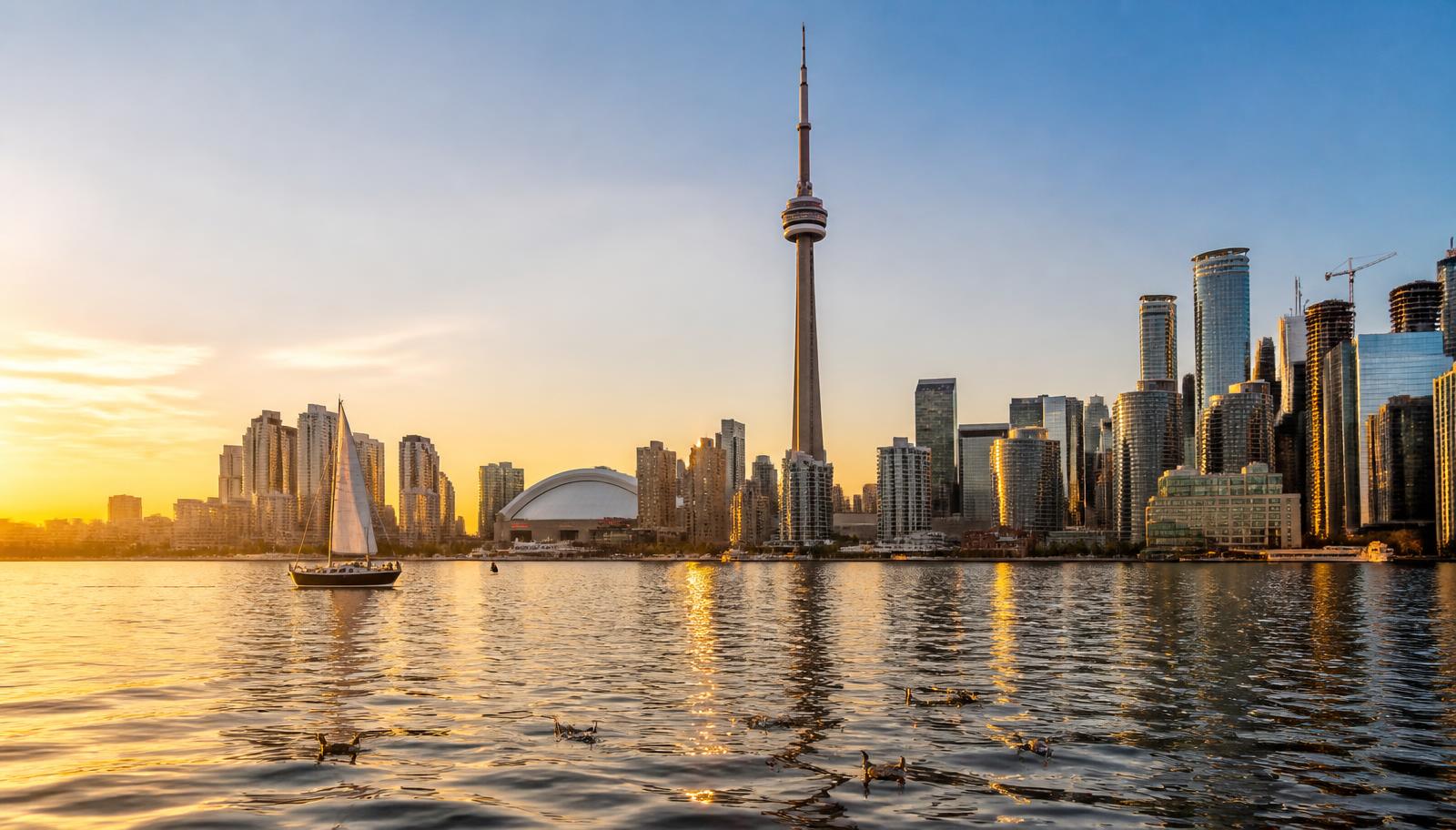 Toronto waterfront with the CN Tower at dusk